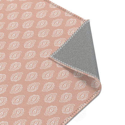 Nursery area rug printed edge to edge with paisley teardrops