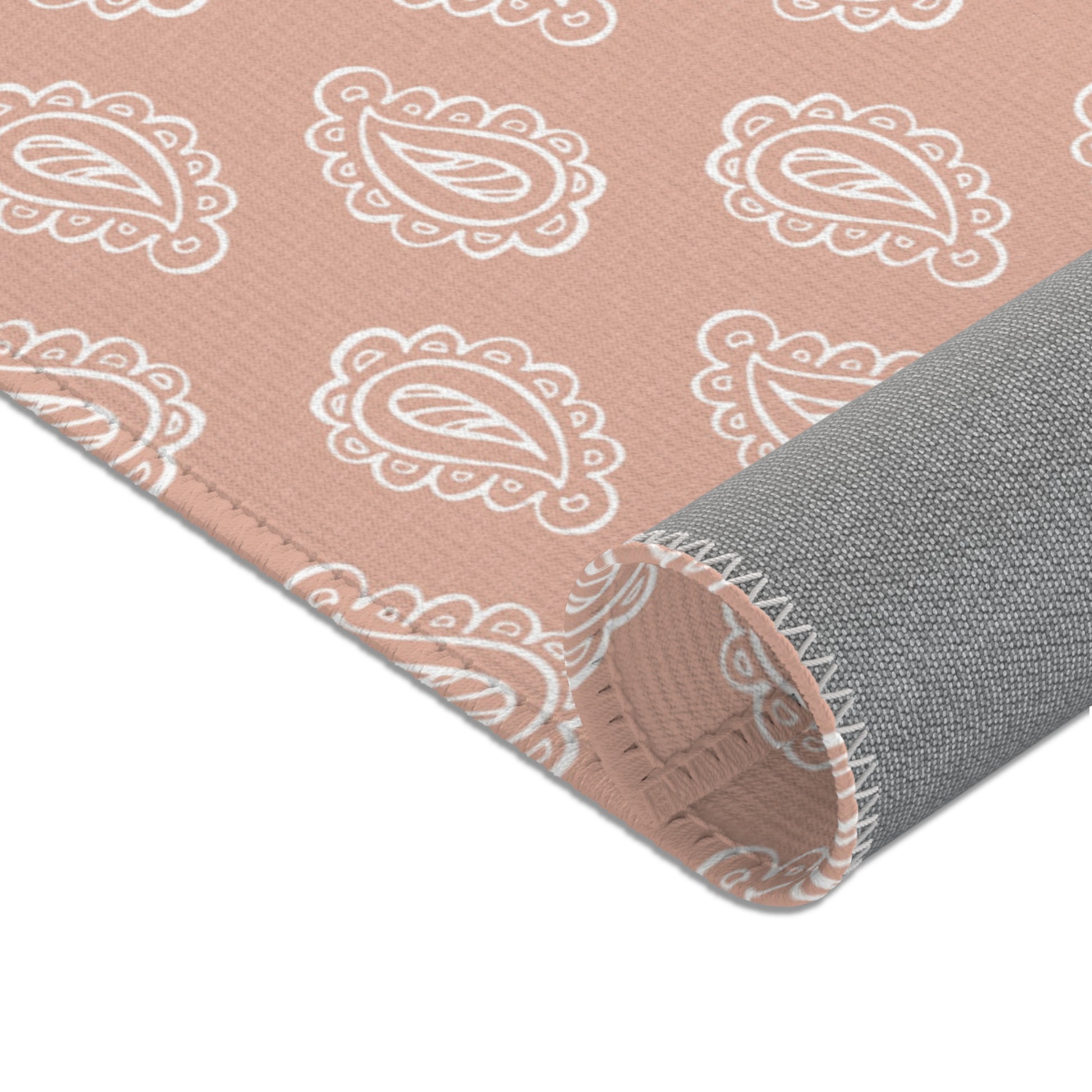 Corner detail of the Clay Paisley nursery area rug