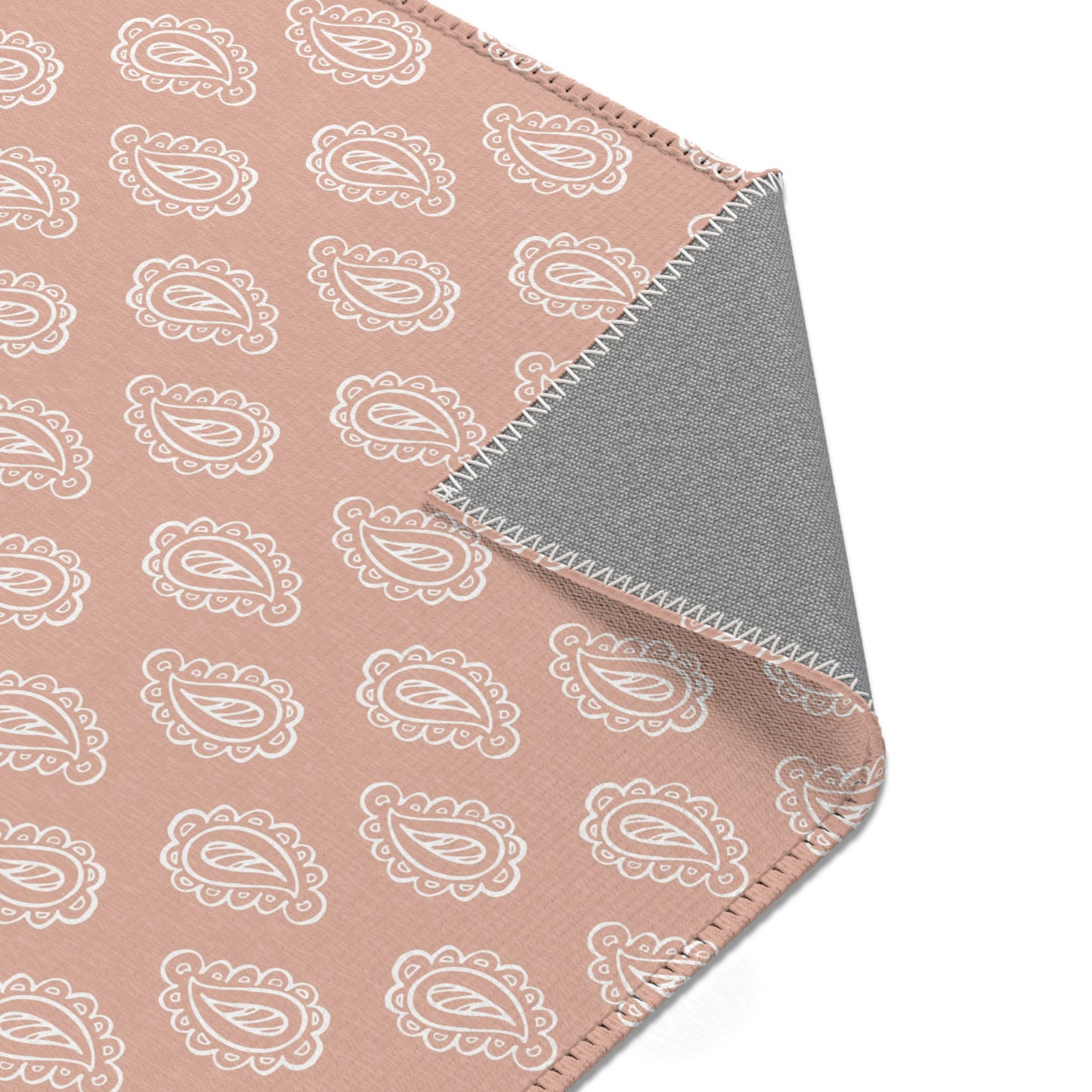 Clay Paisley nursery rug pattern shown flat