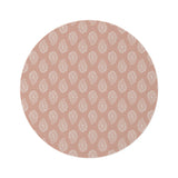 Clay Paisley round nursery rug on a baby room floor