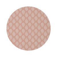 Clay Paisley round nursery rug on a baby room floor