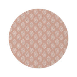 Clay Paisley round nursery rug on a baby room floor