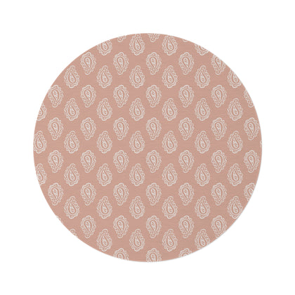Clay Paisley round nursery rug on a baby room floor