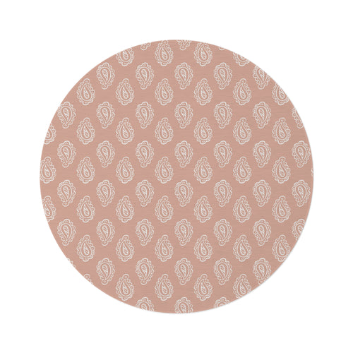 Clay Paisley round nursery rug on a baby room floor