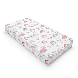 Confetti Rainbows changing pad cover on a nursery changing table