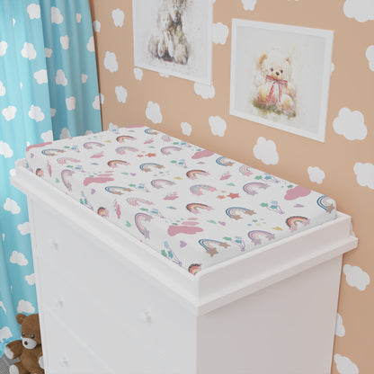 Confetti Rainbows changing pad cover fitted over a contoured pad