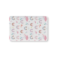 Confetti Rainbows fitted crib sheet on a nursery crib mattress