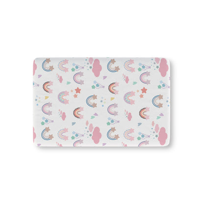 Confetti Rainbows fitted crib sheet on a nursery crib mattress
