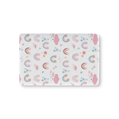 Confetti Rainbows fitted crib sheet on a nursery crib mattress