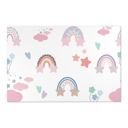 Low pile nursery rug with pastel rainbows and hearts