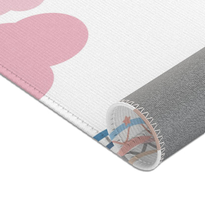Corner detail of the Confetti Rainbows nursery area rug