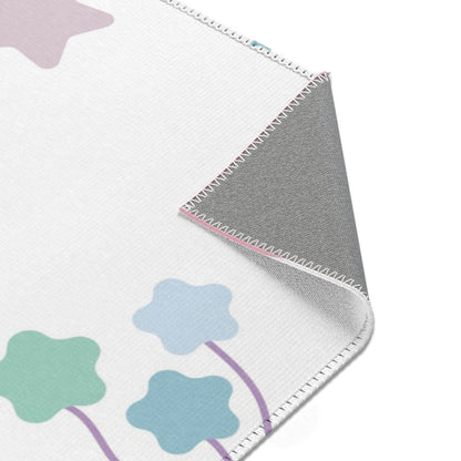 Confetti Rainbows rug print detail in pink and lilac
