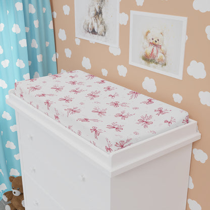 Close detail of the Crimson Bow print on the changing pad cover