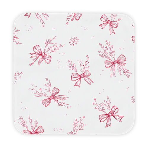 Crimson Bow hooded baby towel wrapped around a baby
