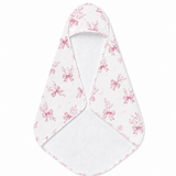 Crimson Bow hooded baby towel wrapped around a baby