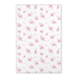 Crimson Bow nursery area rug in a baby girl's bedroom