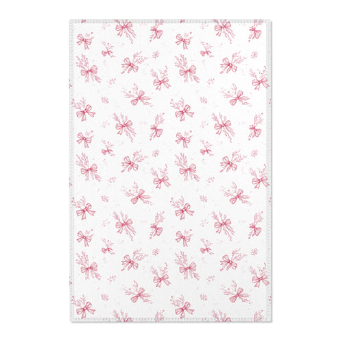 Crimson Bow nursery area rug in a baby girl's bedroom