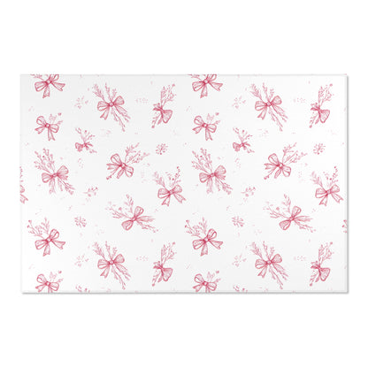 Raspberry bow rug defining a nursery play area