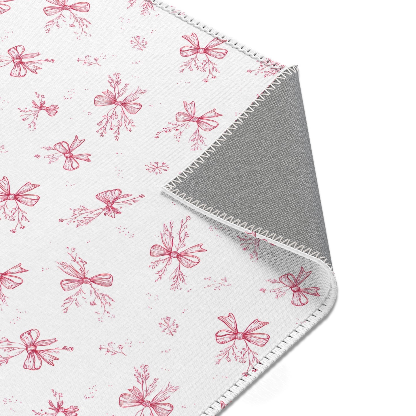 Crimson Bow rug, hand-drawn bows and botanical sprigs