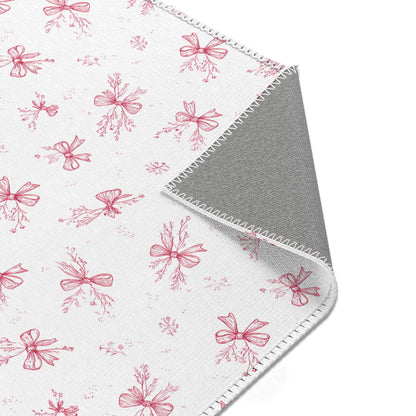 Crimson Bow rug, hand-drawn bows and botanical sprigs