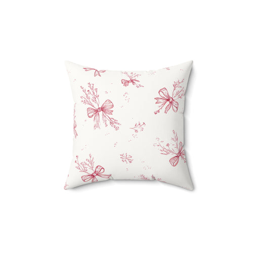 Crimson Bow decorative nursery pillow on a glider chair
