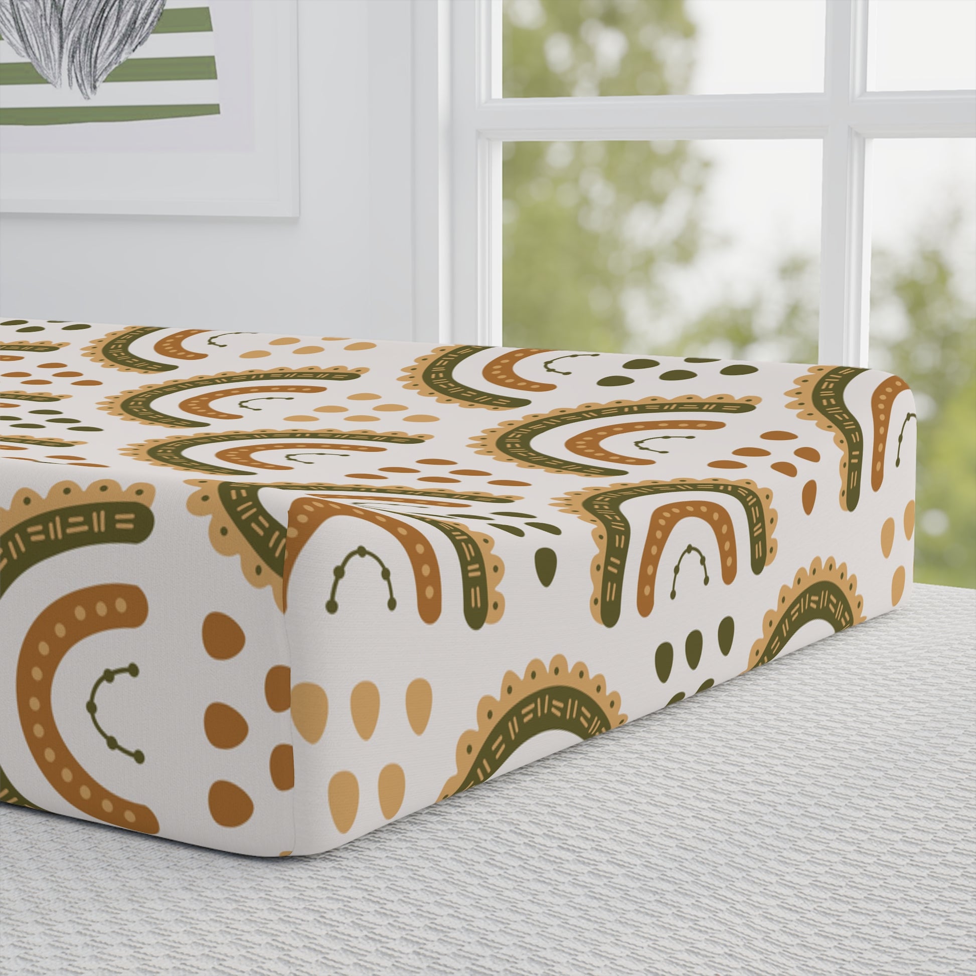 Close detail of the Desert Rainbow print on the changing pad cover