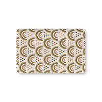 Desert Rainbow fitted crib sheet on a nursery crib mattress