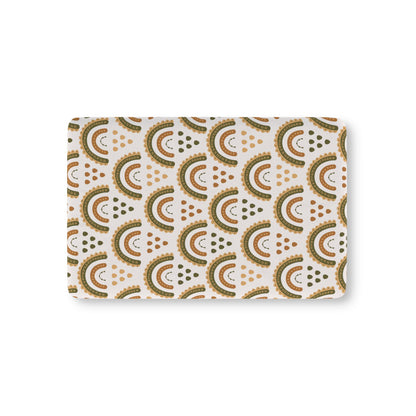 Desert Rainbow fitted crib sheet on a nursery crib mattress