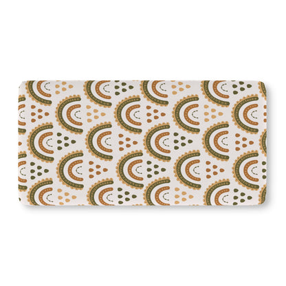 Fitted crib sheet in olive, ochre and rust rainbow arches