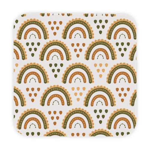 Desert Rainbow hooded baby towel wrapped around a baby