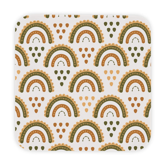 Desert Rainbow hooded baby towel wrapped around a baby