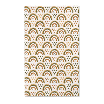 Boho rainbow nursery area rug in olive, ochre and rust
