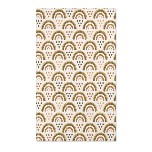 Boho rainbow nursery area rug in olive, ochre and rust