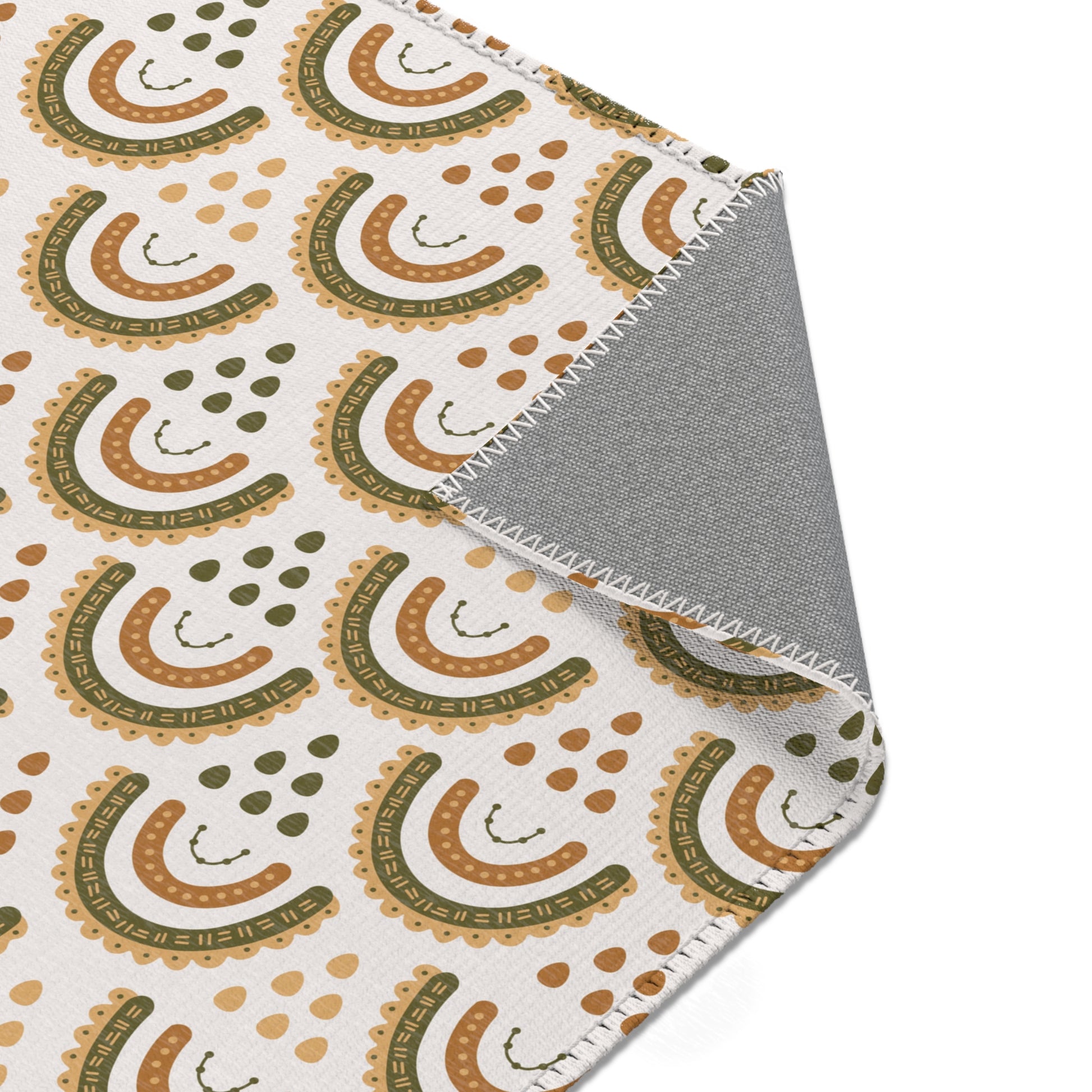 Nursery area rug printed edge to edge with rainbow arches