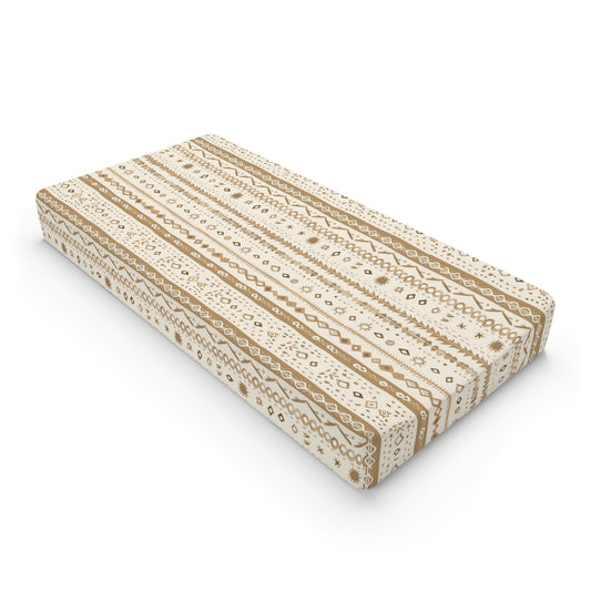 Desert Stripe changing pad cover on a nursery changing table