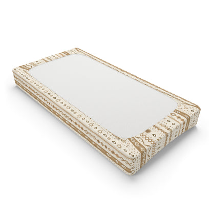 Changing pad cover in camel and tan folk motif stripes