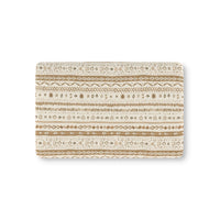 Desert Stripe fitted crib sheet on a nursery crib mattress