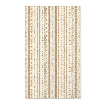 Striped nursery area rug in camel and tan on cream