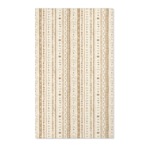 Striped nursery area rug in camel and tan on cream