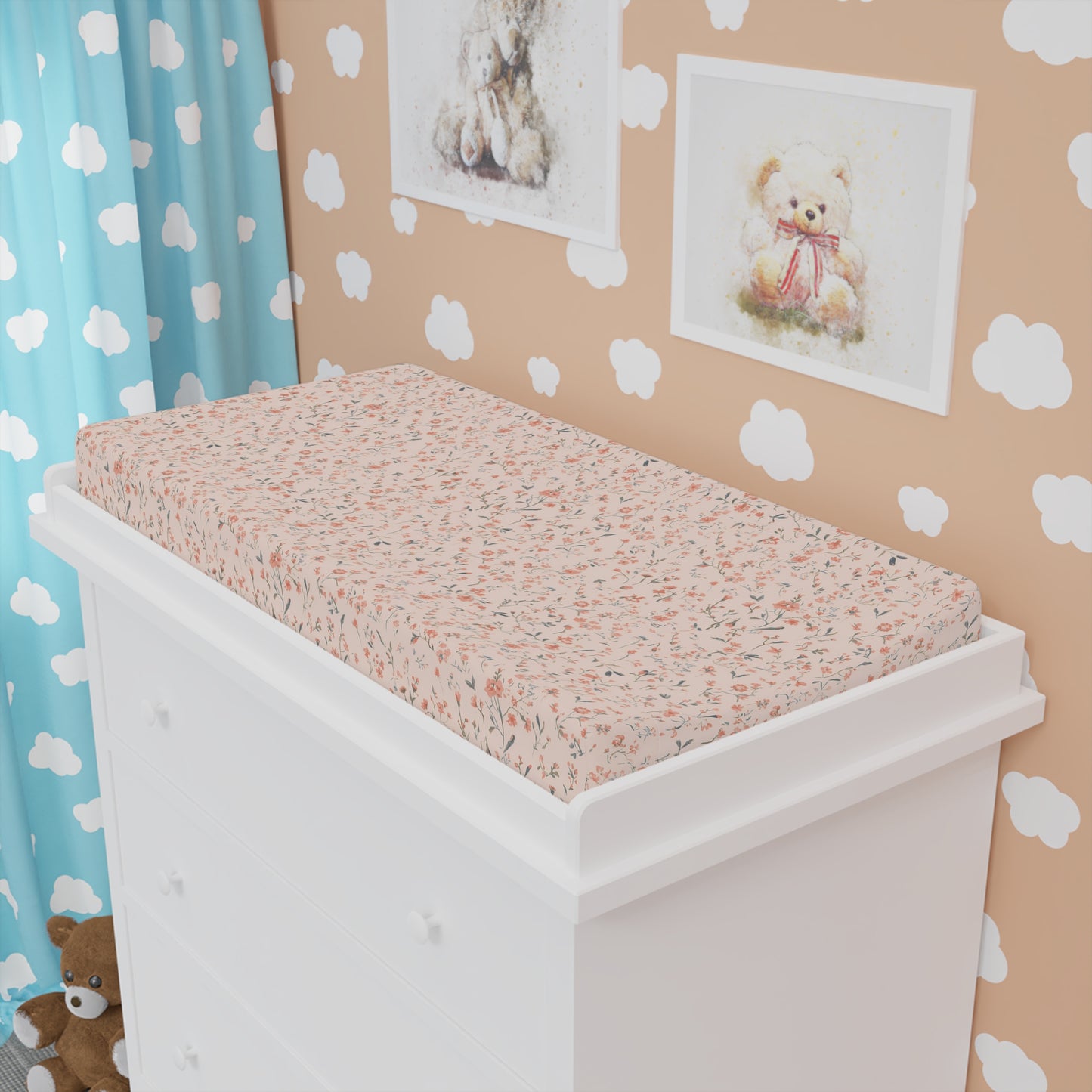 Ditsy Blooms changing pad cover fitted over a contoured pad