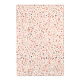 Ditsy Blooms nursery area rug in a baby room