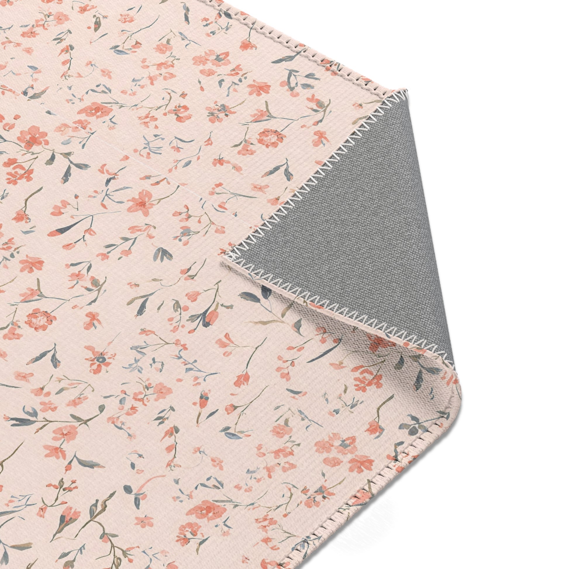 Nursery area rug printed edge to edge with tiny blooms