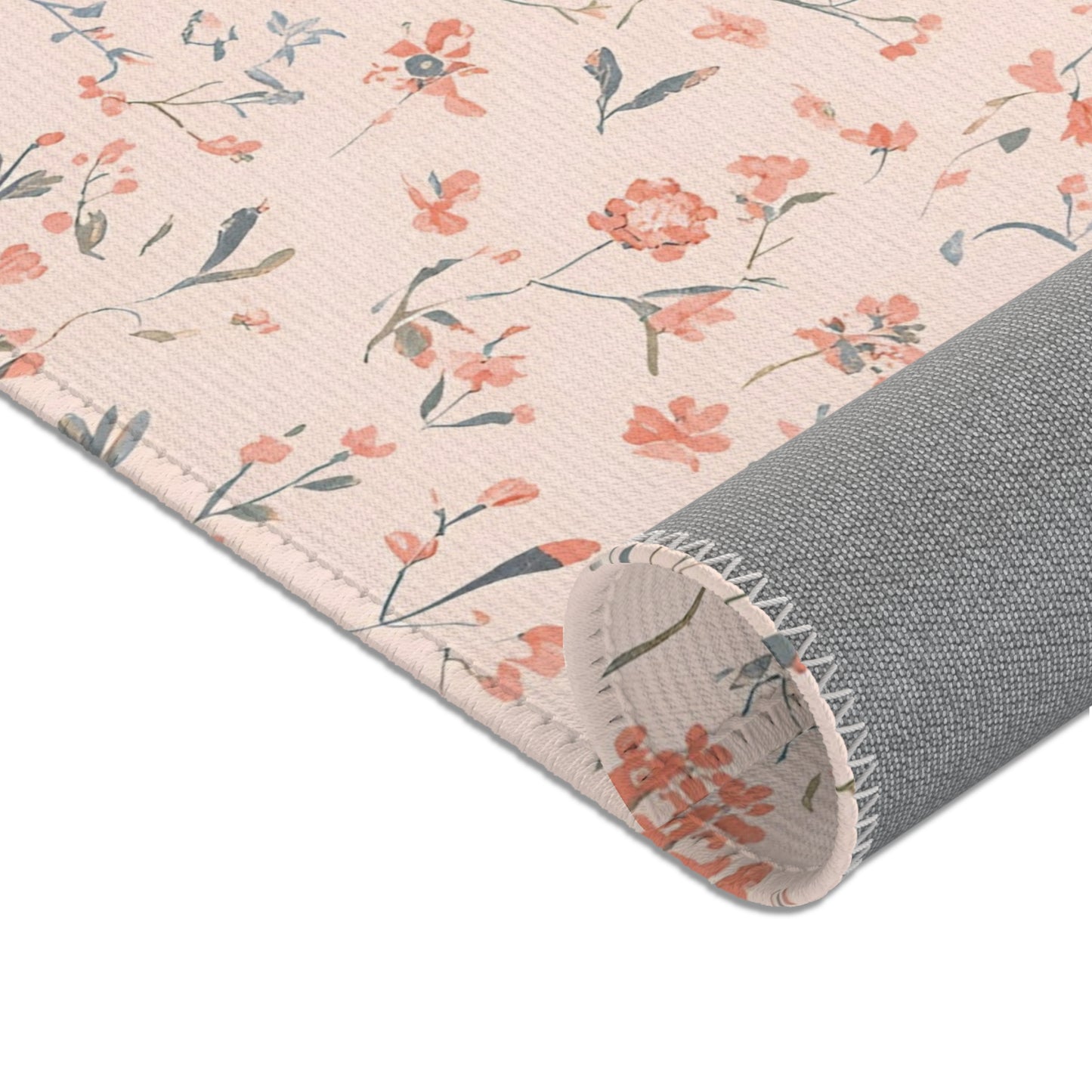 Tiny flowers and fine stems across the nursery area rug