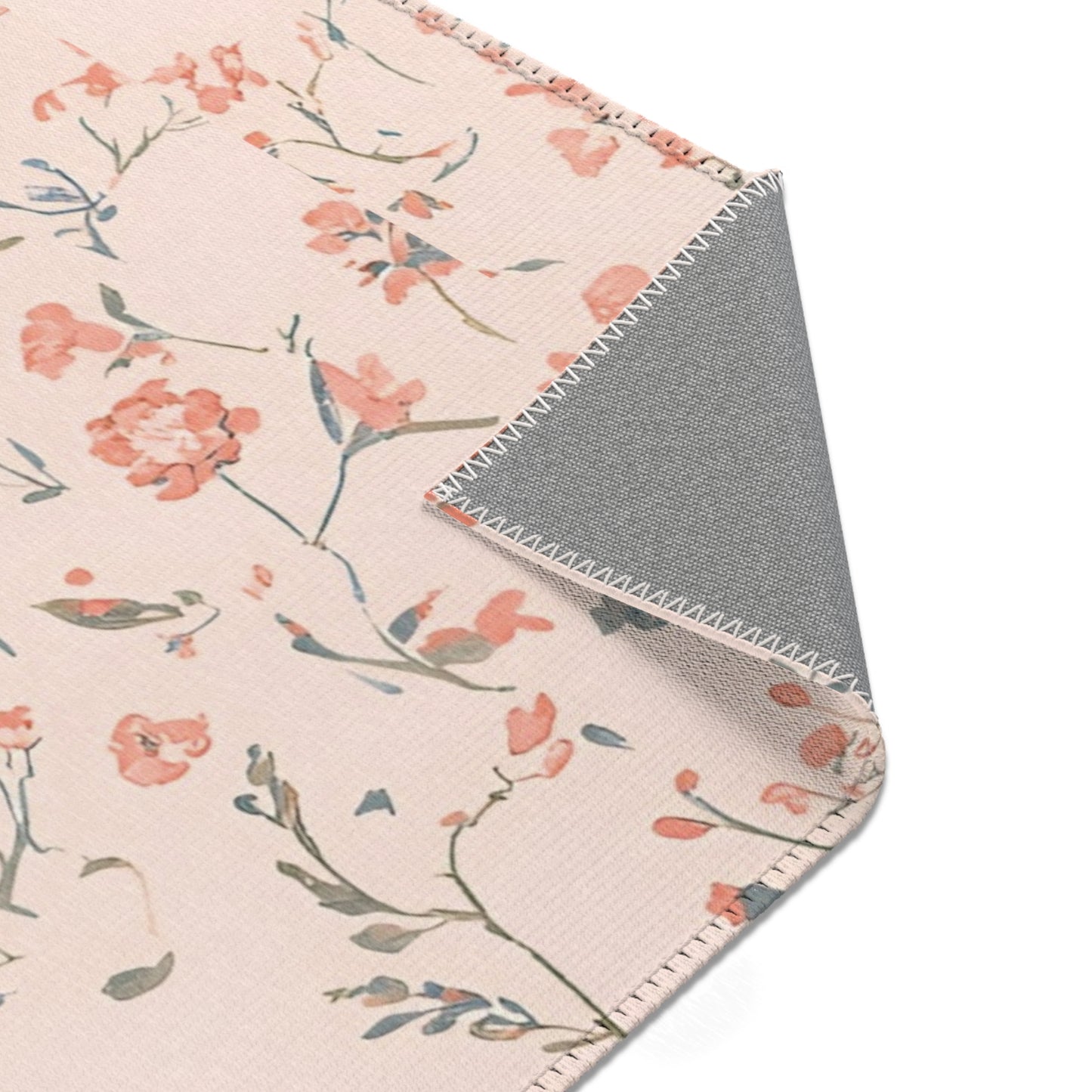 Ditsy Blooms rug print detail in coral and sage