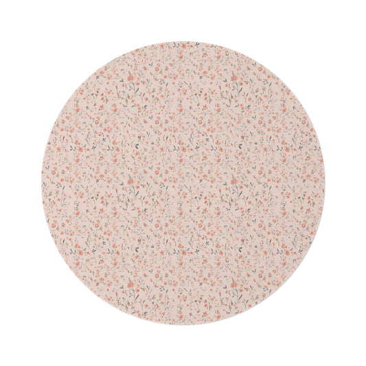 Ditsy Blooms round nursery rug on a baby room floor