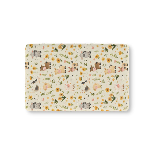 Farmyard Friends fitted crib sheet on a nursery crib mattress