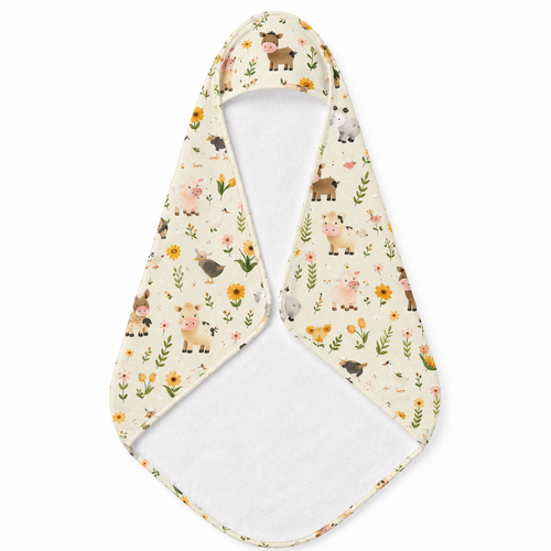 Farmyard Friends hooded baby towel wrapped around a baby