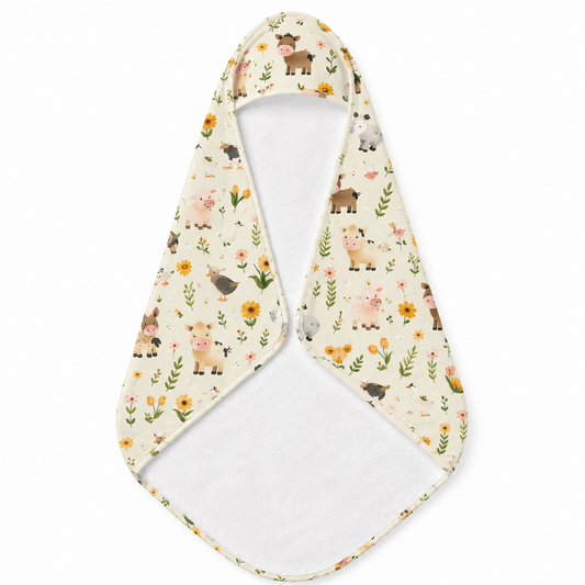 Farmyard Friends hooded baby towel wrapped around a baby