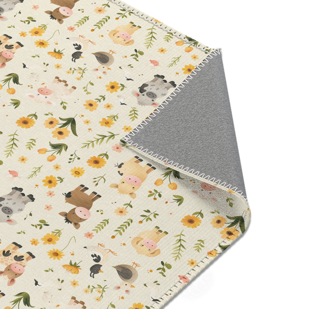 Farm animal print area rug in a baby room play area