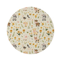 Farmyard Friends round nursery rug on a baby room floor